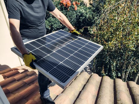 Tiny house with solar panels and rainwater collection system