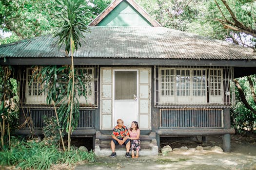 Happy couple in front of their tiny home